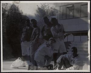 Group of young men looking cool by the steps