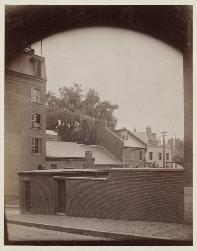 Street view with brick wall