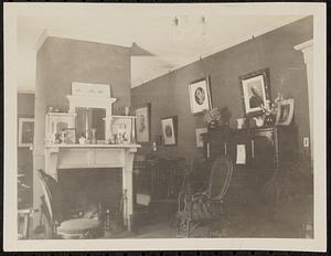 Room with fireplace, mantle, and antiques