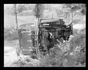 Overturned car on its side