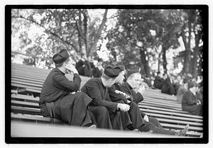 Priests watching football practice, Boston College
