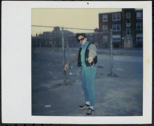 Young person posing in Newtowne Court