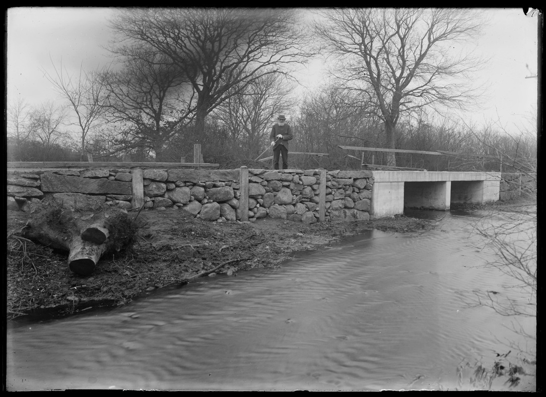 Middletown brook upstream, closer to bridge before repair work was done. Man on bridge