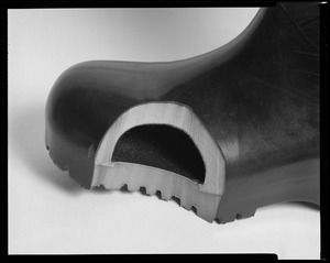 CEMEL, footwear cutaway of black polyurethane boot