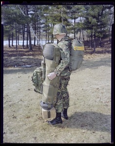 AMEL - parachute branch, model dressed in dragon missile jump pack and other combat jump gear