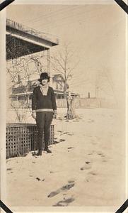 Unidentified woman standing outside in snow