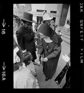 Nun greets black girl on Easter Day, Boston