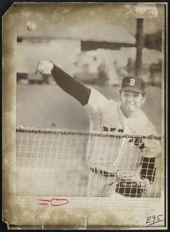 Siebert Takes First Workout -- Boston Red Sox pitcher Sonny Siebert tests his arm as he throws batting practice at first spring training workout in Winter Haven today. Siebert had an operation during winter for removal of calcium deposits on the elbow.