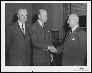 General J.H. "Jimmy" Doolittle, right, national campaign chairman of the United Defense Fund, congratulates Charles Francis Adams, Jr., president of Raytheon Manufacturing Company, Waltham, Mass., as the latter announced his acceptance of the New England Regional UDF chairmanship for 1954. Smiling his approval is Michael T. Kelleher, left, president of the fund.