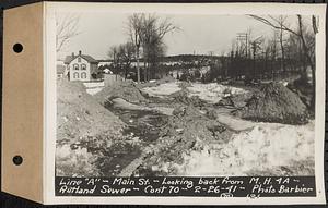 Contract No. 70, WPA Sewer Construction, Rutland, line "A", Main Street, looking back from manhole 4A, Rutland Sewer, Rutland, Mass., Feb. 26, 1941