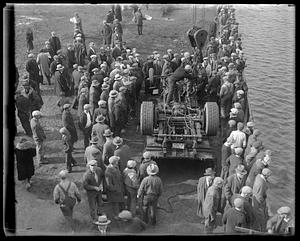 The truck in which two men met their fate when it plunged into the Mystic River at Chelsea Bridge