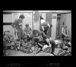 Youth hockey players in locker room, Woburn
