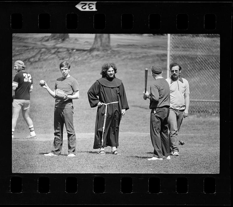 Catholic monk in robes joins softball game, Dorchester