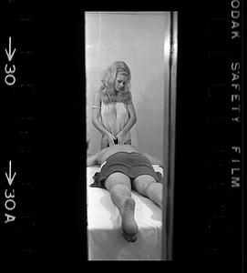 Masseuse at work, Combat Zone