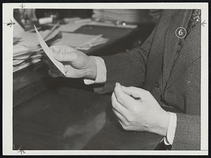 Hand in the New Deal. The hands of Secretary of the Interior Harold Ickes (pictured here), show the result of years of work in his own flower garden. He often is seen to hold his cigarette far down between his first and middle fingers, so that as he smokes his big-knuckles, sandy-haired, veined hand almost covers one side of his face. Ickes' hands are seldom still, though he doesn't often gesture. He clinks the change and keys in his pockets, strokes his chin and cheek, leans backward and puts his thumbs in his vest.