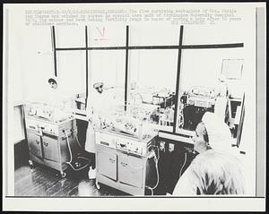 The five surviving sextuplets of Mrs. Sheila Ann Thorns are watched by nurses in special cure unit of Birmingham Maternity Hospital 10/2. The mother had been taking fertility drugs in hopes of having a baby after 10 years of childless marriage.