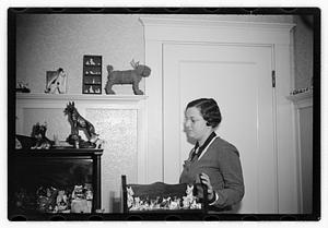 Miss Liddie A Livevey, collector of miniature dogs, 400, 1 live one