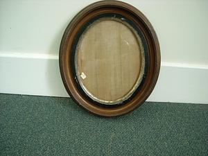 Oval frame with ebonized and gilt inserts