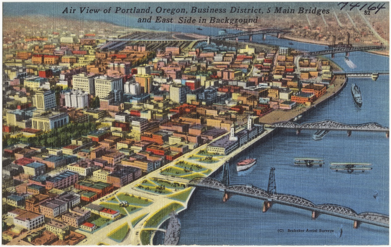 Air view of Portland, Oregon, Business District, 5 main bridges and east side in background