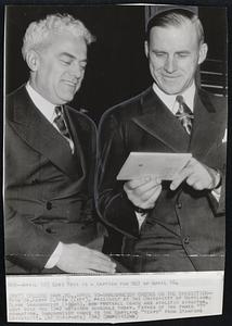 Shaughnessy Checks on the Opposition--With Dr. Harry C. Byrd (left), president of the University of Maryland. Clark Shaughnessy (right), new football coach and athletic director, went over the 1942 gridiron schedule today. Father of the famed "T" formation, Shaughnessy comes to the Maryland "terps" from Stanford University.
