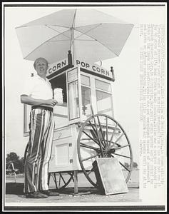 Beverly, Mass.: Kent Zeilon of Beverly, Mass., is sown with his 75-year-old popcorn stand which he recently purchased from a man who had run it 40 years at it's Dane Street Beach location. Zeilon was a project manager for Dynamics Research Corp. in Wilmington, Mass. until seven months ago he joined the ranks of the Route 128 professionals who are unemployed because of government cut backs on defense contract. Zeilon sells popcorn and peanuts every day at the beach.