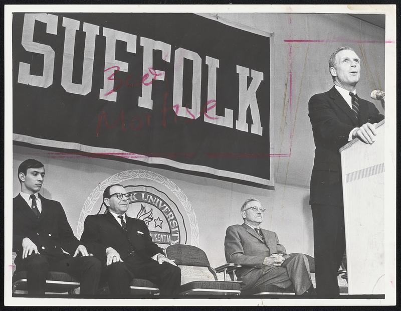 Mayor White speaks to students at Suffolk University. Watching are, from left, Gary Pappas, vice president of government; Dr. Dion J. Archow, and Dean Donald W. Goodrich.