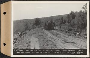 Contract No. 60, Access Roads to Shaft 12, Quabbin Aqueduct, Hardwick and Greenwich, bulldozer spreading fill, looking ahead from Sta. 15+05, Greenwich and Hardwick, Mass., May 2, 1938