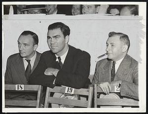Big Names At Big Time Fight Max Schmeling (center), who has a victory over the World Champion Joe Louis, was at the ring side of the Louis-Farr fight in New York City August 30. With Max are his manager, Max Machon (left) and Joe Jacobs (right).