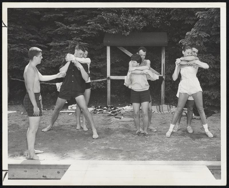 Drills on Land-Teaching those are instructor Peter Crone of Belmont and his students are, left to right, Virginia Milott, Newton, and Dave Sterling, Hingham; Gail Dollar, Wickford, R. I., and Ken Carwile, Cambridge, and Jocelyn Douglass, Bernardsville, N. J., and Matthew Iagatta, Walpole.