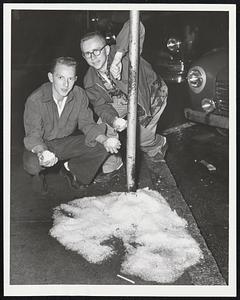Five Hours After the Storm, Al Thurston (at left) and Gordon "Dusty" Rhodes have a pile of hailstones on Beacon street, Waban, big enough for a snowball fight.