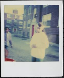 Smiling girl in white sweatshirt