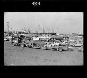 New Toyotas trucked from Northern Avenue pier, Boston