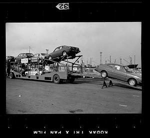 New Toyotas trucked from Northern Avenue pier, Boston