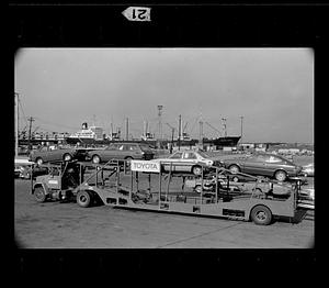 New Toyotas trucked from Northern Avenue pier, Boston