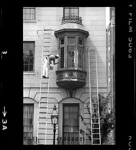 Painting bay window on Beacon Street opposite Public Garden, Boston