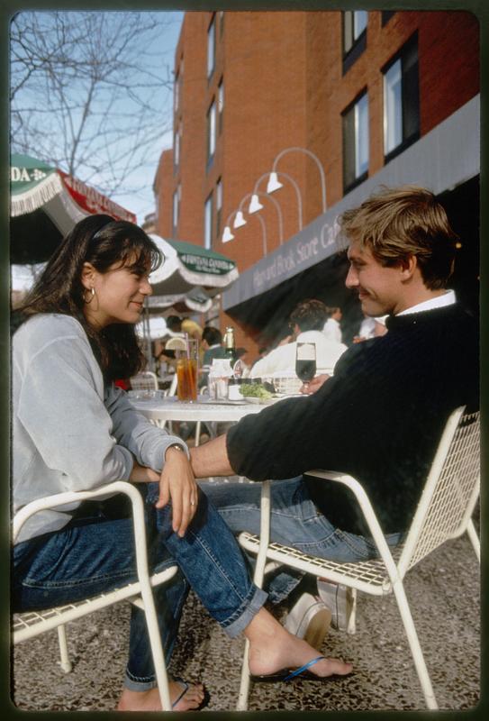 Young couple at outdoor Newbury Street café, Back Bay, Boston