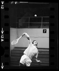 Rod Laver makes a tennis serve at Boston College, Chestnut Hill, MA