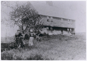 Parson Capen House with people on lawn