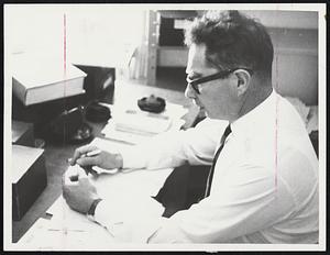 Editor at Work - Dov Ben Abba, once Dov Katz of Boston, is shown in his office in Jerusalem where he edits copy for leading Israeli publishing firm. Ben Abba, a sometimes stringer for the UPI, also has translated several Hebrew manuscripts into English.