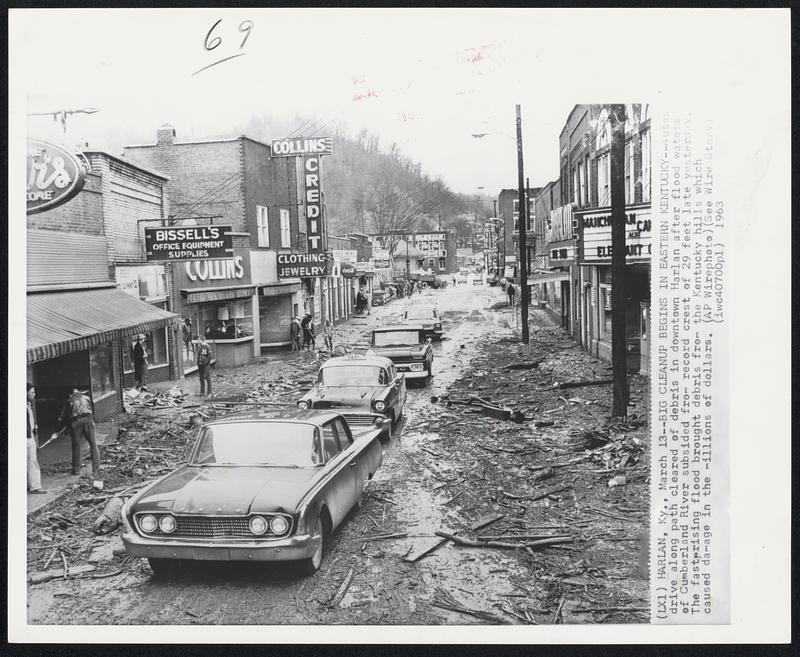 Harlan, Ky. Big Cleanup Begins In Eastern Kentucky Autos drive
