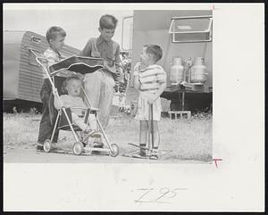 Playtime - Life in the new Lincolnwood Park trailer city in Worcester is great fun for these youngsters. Left to right, Raymond Bouvier, 6; Stephen Marhafer, 18 months; Richard Bouvier, 9, and Bobby Marhafer, 4.