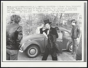 Refused Induction--A former Brown University student, Raymond Frenchman of Berkley Heights, N.J., arrives at Washington Ave. induction center clad in top hat and tails. He refused induction into the Army.