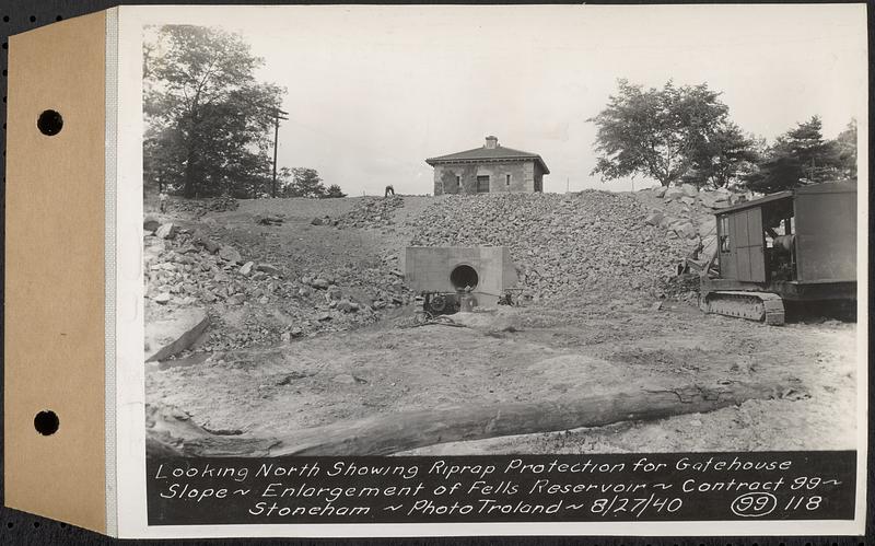 Contract No. 99, Enlargement of Fells High Level Distribution Reservoir, Stoneham, Malden, Melrose, looking north showing riprap protection for gatehouse slope, enlargement of Fells Reservoir, Stoneham, Mass., Aug. 27, 1940