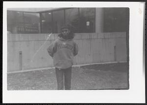 Portrait of young woman wearing a sweatshirt