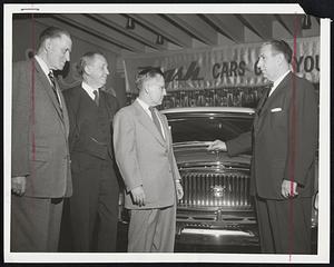 At New Nash Showing - New England Nash dealers and company officials met yesterday at the Hotel Somerset to view the 1955 Nash line of cars. Left to right are Frank H. Marr, eastern division manager; Harlan T. Pierpont, Worcester bank president; Charles Keller, Boston zone manager for Nash, and Roy Abernethy, Nash vice president.
