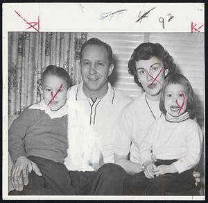 Holding Out-Roy Sievers, Washington Senator outfielder, seeking 100 per cent pay raise, is shown with wife, Jo, and children Robin, 5, and Shawn, 3. He received $18,000 last season when he led the American League in RBI’s and home runs.