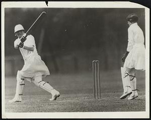 By Crickets: They’re In This Sport, Too! The fair sex is to be found is nearly every major sport these days, and here are several of them, devout followers of the game of cricket in a stirring match at Beckenham, England. Miss K. Doman wears a jockey cap while batting.