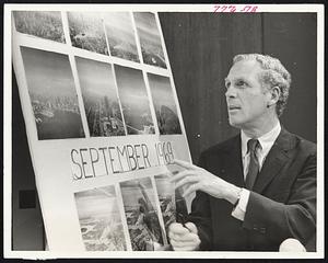 Mayor White displays pictures showing air pollution in Boston.