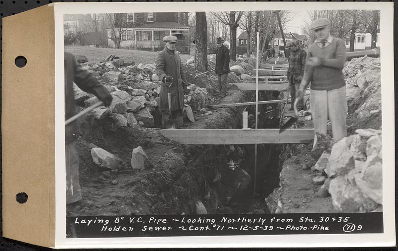 Contract No. 71, WPA Sewer Construction, Holden, laying 8 in. vitrified clay pipe, looking northerly from Sta. 30+35, Holden Sewer, Holden, Mass., Dec. 5, 1939