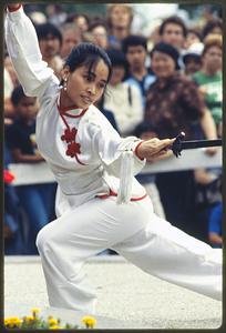 Boston - Hatch Shell: A dancer holds a sword during a performance, Dragon Boat Fest 1982